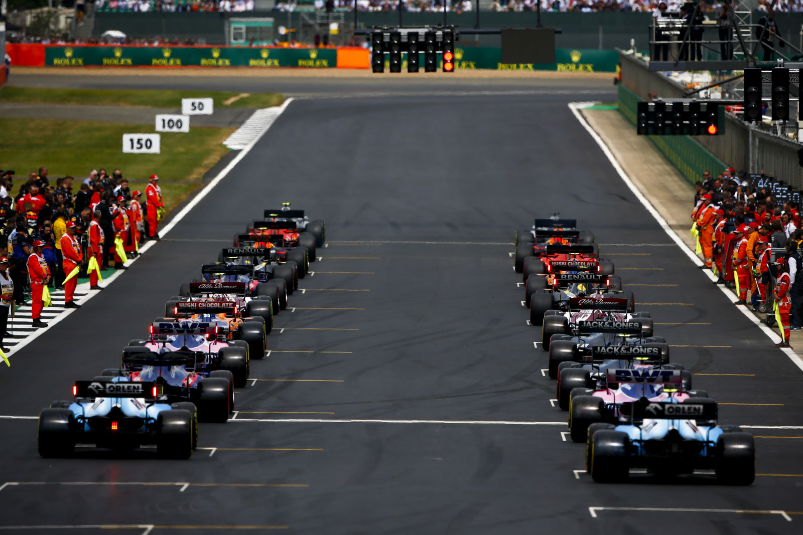 20 Formula 1 cars arranged on the starting grid of the 2019 British Grand Prix